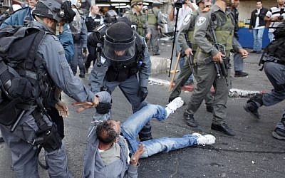 Police arrest a number of Palestinian youths at the Damascus Gate during a demonstration against the Jerusalem Day march on Sunday (photo credit: Sliman Khader/Flash90)