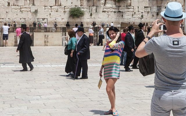 Tourists in front of the Western Wall in Jerusalem's Old City in May 2012. (photo credit: Uri Lenz/Flash 90)