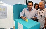 Histadrut chairman Ofer Eini casts his ballot for union leadership on Tuesday (photo credit:  Roni Schutzer/Flash90)