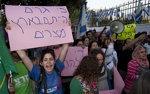 Demonstrators in Jerusalem protest racist incitement and violence against African migrants in Israel on Thursday (photo credit: Yonatan Sindel/Flash90) Demonstrators in Jerusalem protest racist incitement and violence against African migrants in Israel on Thursday (photo credit: Yonatan Sindel/Flash90)