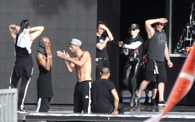 Paparazzi staking out Madonna's MDNA rehearsals (photo credit: Yonatan Sindel/Flash 90) Paparazzi staking out Madonna's MDNA rehearsals (photo credit: Yonatan Sindel/Flash 90)