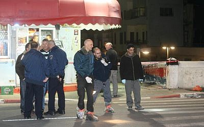 Illustrative photo of police at a crime scene in Jaffa (photo credit: Roni Shutzer/Flash90)