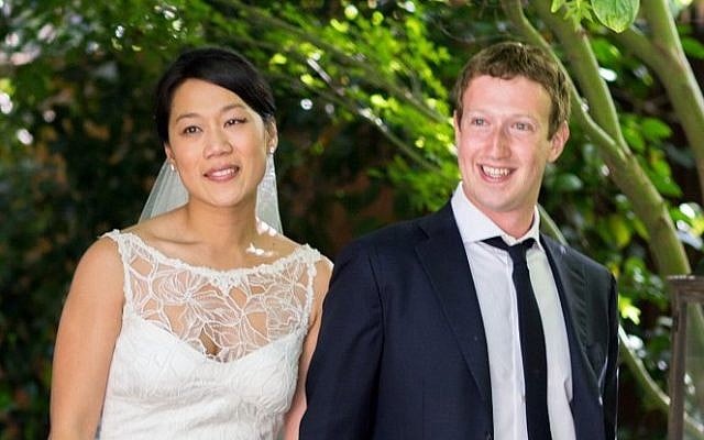 Facebook founder and CEO Mark Zuckerberg and Priscilla Chan at their wedding ceremony in Palo Alto, California on May 19, 2012 (AP/Facebook, Allyson Magda Photography)