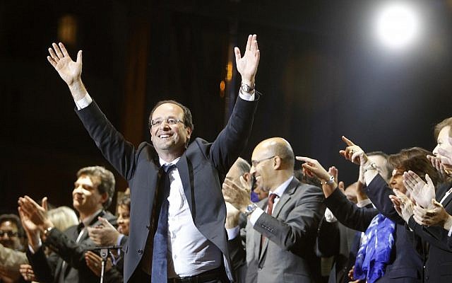 French president-elect Francois Hollande waves to crowds gathered to celebrate his victory in presidential elections in May (photo credit: Laurent Cipriani/AP) French president-elect Francois Hollande waves to crowds gathered to celebrate his victory in presidential elections in May (photo credit: Laurent Cipriani/AP)