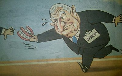 Photo of political cartoon in Maariv, May 15, 2012.