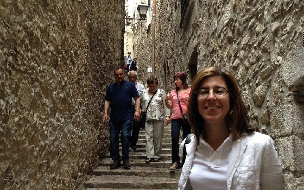 The writer in one of the narrow alleys of the Call, used by her ancestors 520 years ago. (photo credit: courtesy) The writer in one of the narrow alleys of the Call, used by her ancestors 520 years ago. (photo credit: courtesy)