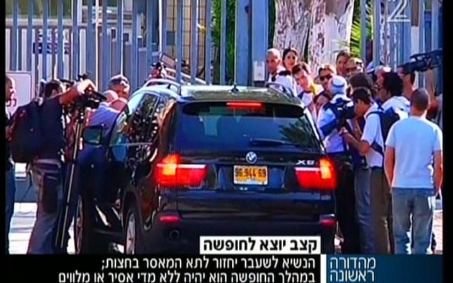 Moshe Katsav leaving prison on Sunday. (Screenshot/Channel 2)