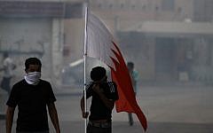 Bahraini anti-government protesters during clashes in Bahrain in 2012 (photo credit: AP/Hasan Jamali)