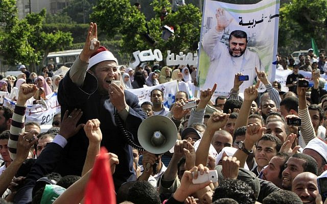 Muslim Brotherhood supporters demonstrate in Cairo (photo credit: AP Photo/Amr Nabil)