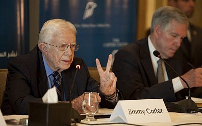Former US President Jimmy Carter outlines the initial assessments of the Carter Center's election observation mission during a press conference in Cairo, Egypt on Saturday (photo credit: AP/Pete Muller)