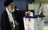 Iranian supreme leader Ayatollah Ali Khamenei,casts his ballot for the parliamentary runoff elections, in Tehran, last May (photo credit: AP/Office of the Iranian Supreme Leader)