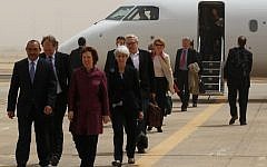 Negotiators from the US and five other world powers arrive at Baghdad International Airport for talks with Iranian diplomats last month. (photo credit: AP/Mohammed Ameen)