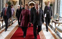 Iraq's Foreign Minister Hoshyar Zebari, 2nd right, walks with the EU foreign policy chief Catherine Ashton upon her arrival at Baghdad International Airport in Iraq, Wednesday. (photo credit: AP/Mohammed Nameen/pool)