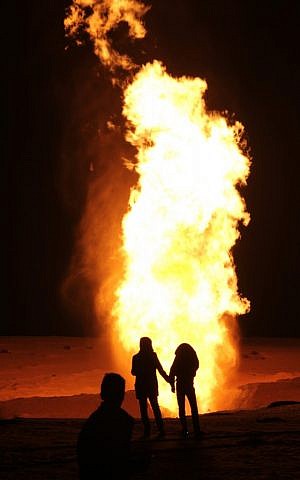 Flames rise from a gas pipeline explosion in el-Arish, Egypt, in March. (photo credit: AP)