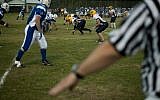 Israel's national American football team plays against NCAA Division III team Maranatha Baptist Bible College at the Baptist Village sport complex near Petah Tikva in 2012. (Ariel Schalit/AP)