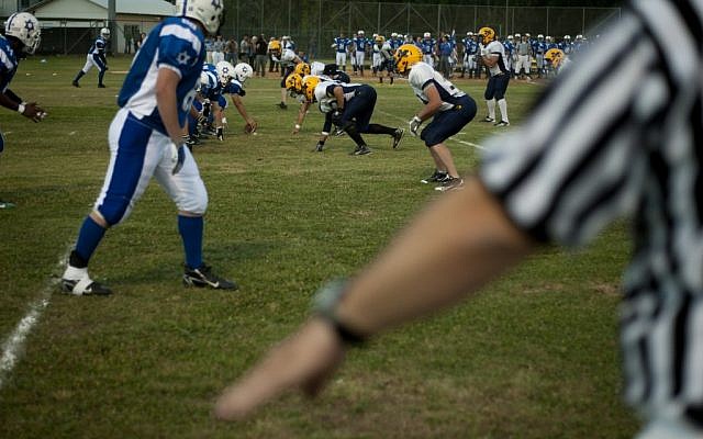Israel's national American football team plays against NCAA Division III team Maranatha Baptist Bible College at the Baptist Village sport complex near Petah Tikva in 2012. (Ariel Schalit/AP) Israel's national American football team plays against NCAA Division III team Maranatha Baptist Bible College at the Baptist Village sport complex near Petah Tikva in 2012. (Ariel Schalit/AP)