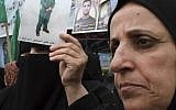 Palestinian women protest in solidarity with hunger strikers (photo credit: AP photo/Hatem Moussa)