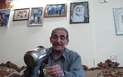  Ali Khatib pours coffee in his home in the village of Shaab (photo credit:AP/Ben Hubbard)