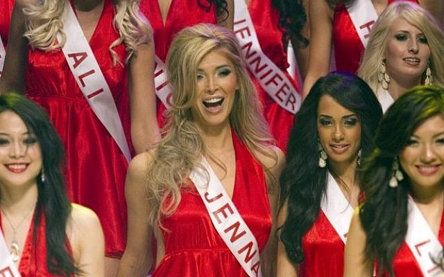 Transgendered beauty queen Jenna Talackova, center, appears in the Miss Universe Canada pageant in Toronto on Saturday May 19, 2012. (photo credit: AP Photo/The Canadian Press, Chris Young) Transgendered beauty queen Jenna Talackova, center, appears in the Miss Universe Canada pageant in Toronto on Saturday May 19, 2012. (photo credit: AP Photo/The Canadian Press, Chris Young)