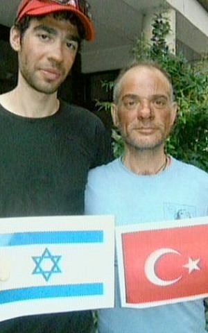 Israeli mountain climber Nadav Ben Yehuda with Aydin Irmak, the Turkish climber he rescued on Mount Everest at the weekend. (Photo credit: Channel 2 screen capture)