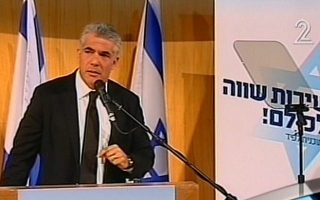 Yair Lapid addresses supporters Tuesday at the first political rally for his newly formed Yesh Atid (There is a future) party (photo credit: screenshot courtesy Channel 2) Yair Lapid addresses supporters Tuesday at the first political rally for his newly formed Yesh Atid (There is a future) party (photo credit: screenshot courtesy Channel 2)