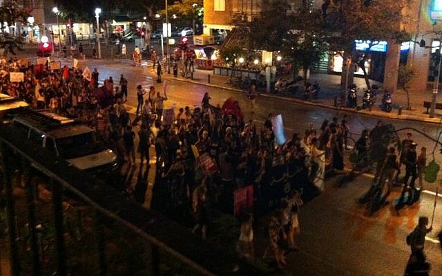 Demonstrators marching through central Tel Aviv last week to protest 45 years of Israeli rule in the West Bank. (photo credit: Sam Newman)