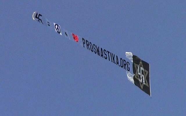 Raelians fly the swastika above New York in an attampt to rehabilitate the symbol, which they see as having been corrupted by the Nazis (photo credit: via Corey Kilgannon's Twitter) Raelians fly the swastika above New York in an attampt to rehabilitate the symbol, which they see as having been corrupted by the Nazis (photo credit: via Corey Kilgannon's Twitter)