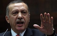Turkish Prime Minister Recep Tayyip Erdogan speaks at the parliament in Ankara (photo credit: AP/Burhan Ozbilici)