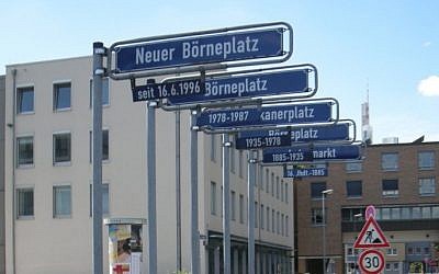 Signs at the Borneplatz show the various names by which it was called over the years. (photo credit: K R Horovitz)