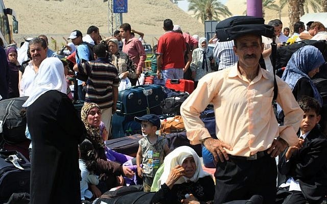 Palestinians wait at the Allenby Bridge border crossing between Israel and Jordan (photo credit: Kobi Gideon/Flash90) Palestinians wait at the Allenby Bridge border crossing between Israel and Jordan (photo credit: Kobi Gideon/Flash90)