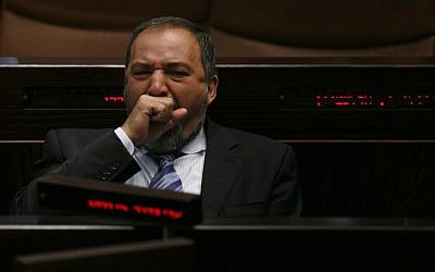 Foreign Minister Avigdor Liberman yawns during a Knesset plenary session (photo credit: Miriam Alster/Flash90)