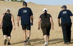 Illustrative photo of overweight people hiking at the Wingate institute in Israel. (Moshe Shai/Flash90)
