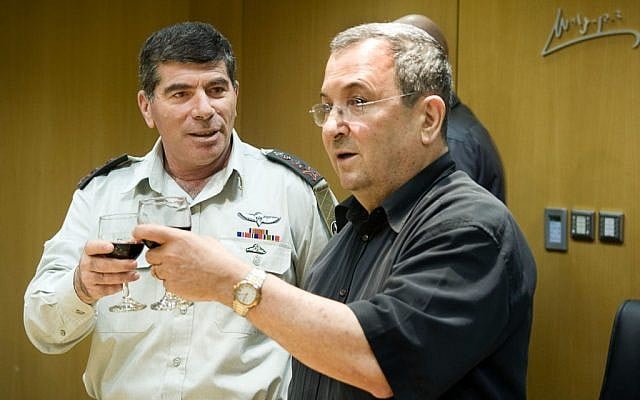 Gabi Ashkenazi, left, and Ehud Barak share a toast in 2010. (photo credit: Arielle Yahalom/IDF Spokesperson/Flash90)