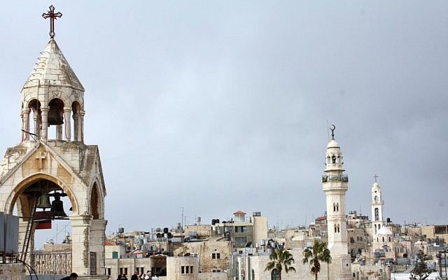 The Church of the Nativity (left) and the 19th-century mosque of Omar ibn al-Khattab looking over Manger Square in Bethlehem (photo credit: Najeh Hashlamoun/Flash90) The Church of the Nativity (left) and the 19th-century mosque of Omar ibn al-Khattab looking over Manger Square in Bethlehem (photo credit: Najeh Hashlamoun/Flash90)