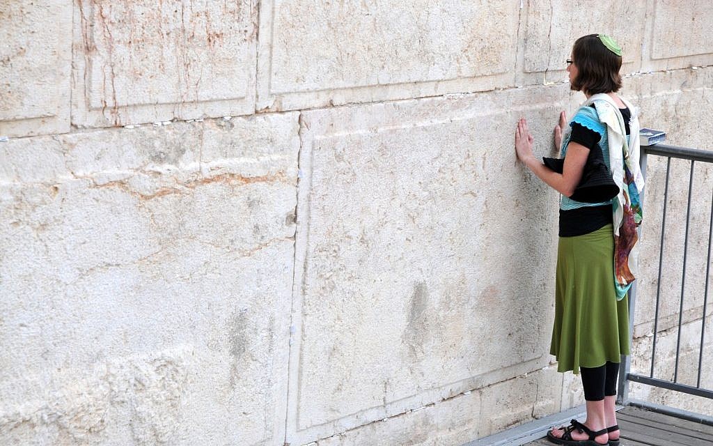 A member of Women of the Wall, wearing a tallit and kipa during prayer (photo credit: Sophie Gordon/Flash90) A member of Women of the Wall, wearing a tallit and kipa during prayer (photo credit: Sophie Gordon/Flash90)