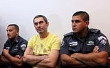 Aleksander Cvetkovic (center) in court, August 2011 (photo credit: Kobi Gideon/Flash90)