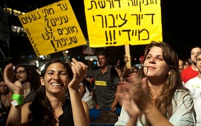 Dafni Leef, right, one of the leaders of last year's social protest, in Tel Aviv last September (photo credit: Jorge Novominsky/Flash90)