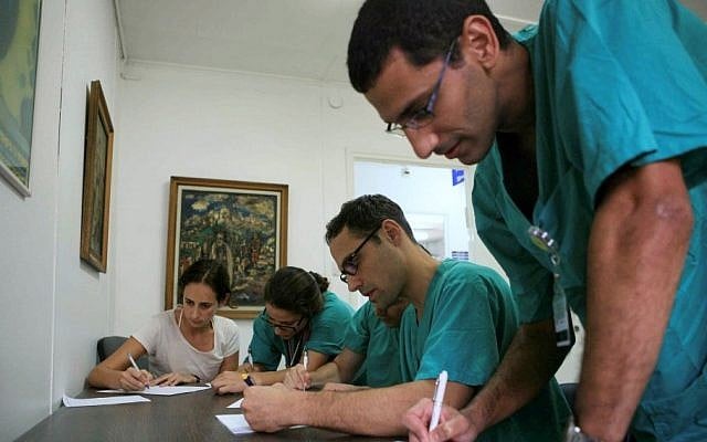 Doctors at Sheba hospital in Tel Hashomer (illustrative photo credit: Yehoshua Yosef/Flash90)
