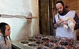 Illustrative photo of a kosher butcher slaughtering a chicken. (Miriam Alster/Flash90)