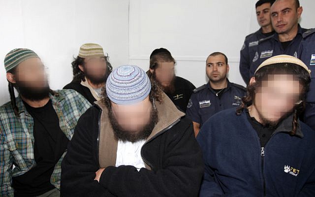 Young right-wing extremists sit in the Magistrate's Court in Jerusalem, arrested for suspicion of involvement in 'Price Tag' actions in December 2011 (photo credit: Miriam Alster/Flash90)