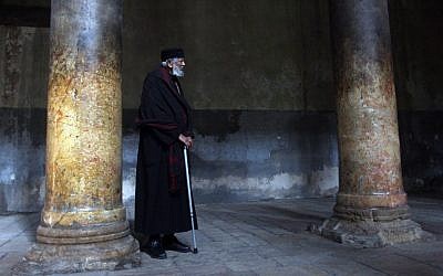 A Christian Orthodox monk tours the Church of Nativity in the West Bank town of Bethlehem in January (photo credit: Issam Rimawi/Flash90) A Christian Orthodox monk tours the Church of Nativity in the West Bank town of Bethlehem in January (photo credit: Issam Rimawi/Flash90)