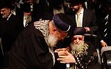 Late Shas spirtual leader Rabbi Ovadia Yosef (seated) and Chief Sephardi Rabbi Shlomo Amar during a Shas party Passover gathering, April 2012. (photo credit: Uri Lenz/Flashh90)