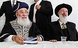 Sephardi Chief Rabbi Shlomo Amar (left) and Ashkenazi Chief Rabbi Yona Metzger at the Western Wall in Jerusalem in April 2012 (photo credit: Uri Lenz/Flash90)