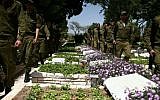 Soldiers at the military cemetery of Mt. Herzel, April 2012 (photo credit: Yehoshua Yosef/Flash90)