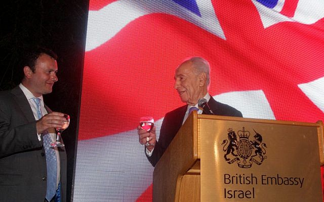 Britain's Ambassador to Israel Matthew Gould and President Shimon Peres toast Queen Elizabeth II at an event marking her Diamond Jubilee (photo credit: Roni Schutzer/Flash90)
