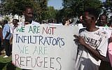 South Sudan migrants gather in Tel Aviv to protest against Israel's immigration policy (photo credit: Roni Schutzer/Flash90)
