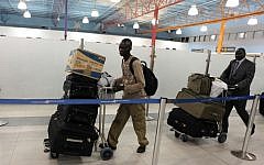 South Sudanese citizens leaving Israel as part of Operation Returning Home (photo credit: Kobi Gideon/GPO/Flash90)