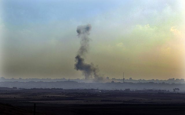 Smoke is seen from the Israeli side of the Israel Gaza border in southern Israel after an air strike by Israeli air force on Hamas base in the Gaza Strip in June (photo credit: Tsafrir Abayov/Flash90) Smoke is seen from the Israeli side of the Israel Gaza border in southern Israel after an air strike by Israeli air force on Hamas base in the Gaza Strip in June (photo credit: Tsafrir Abayov/Flash90)