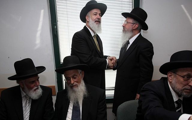 Ashkenazi Chief Rabbi Yona Metzger, center, at the Chief Rabbinate (photo credit: Yossi Zamir/Flash90) Ashkenazi Chief Rabbi Yona Metzger, center, at the Chief Rabbinate (photo credit: Yossi Zamir/Flash90)