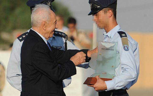 President Shimon Peres at the Israeli Air Force's graduation ceremony on Thursday.  (photo credit: Mark Neyman/GPO/Flash90)